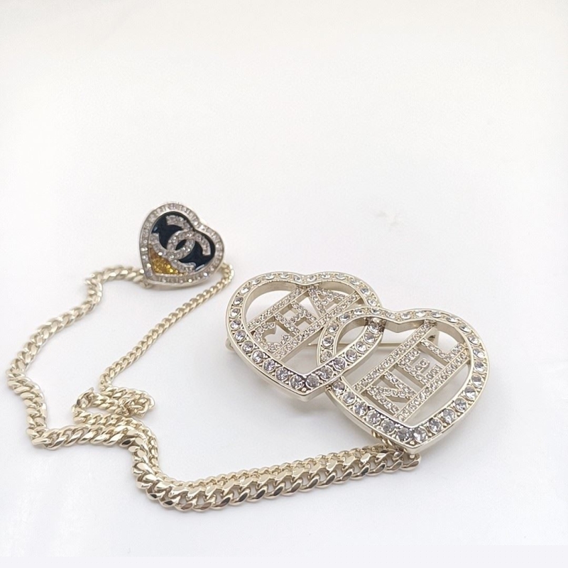 Ch*el brooches